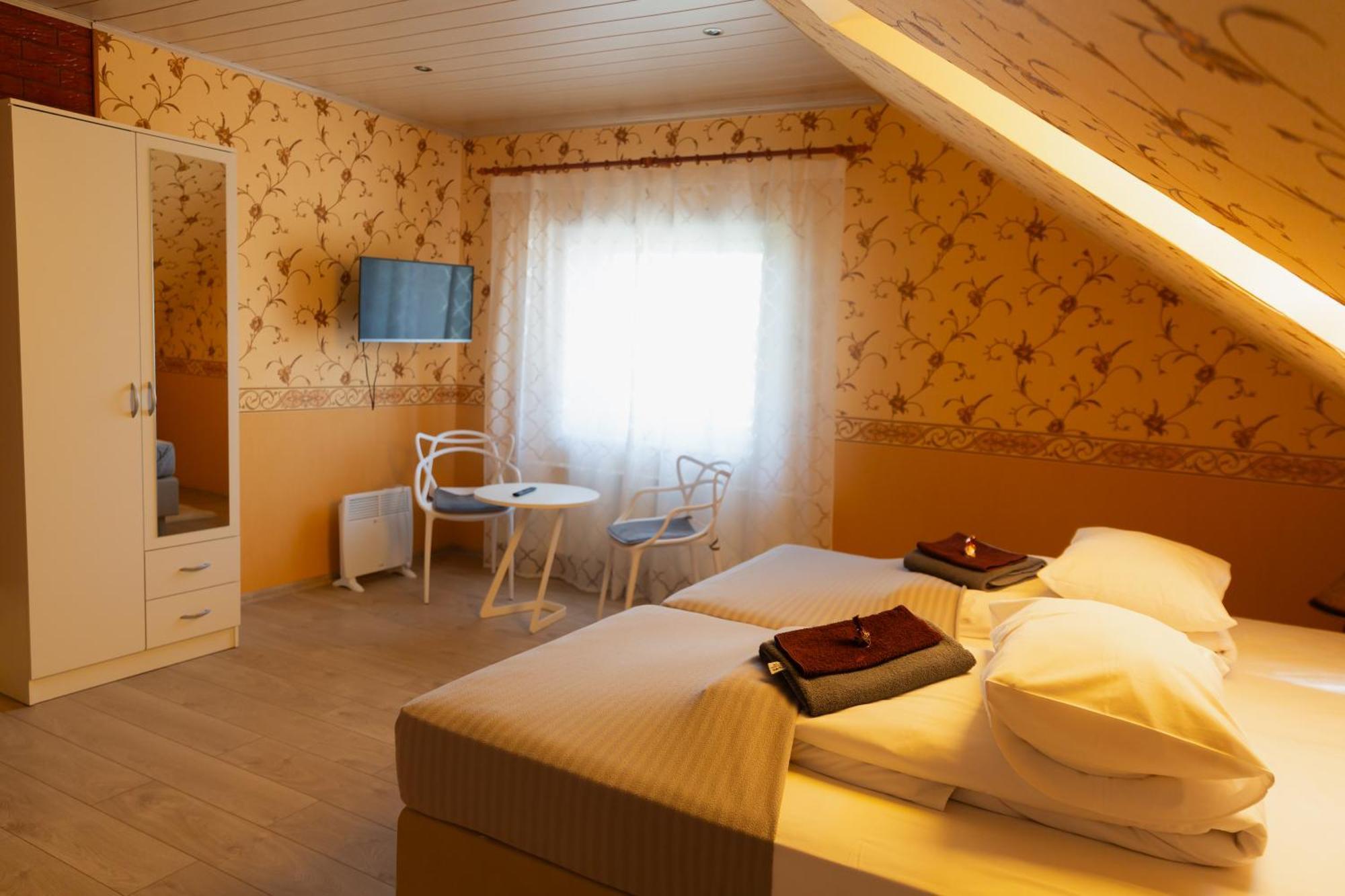 Konrad Family Guesthouse 쿠레사아레 객실 사진